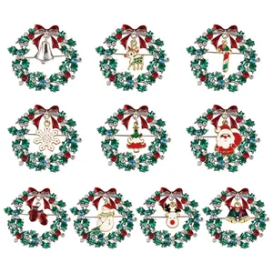 Set of 10 festive Christmas brooches with enamel reindeer, bells, and colorful rhinestones