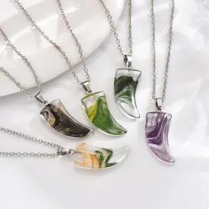 Set of five crescent moon resin necklaces with assorted marble textures on silver chains