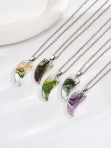 Set of five crescent moon resin necklaces with colorful swirl textures on silver chains