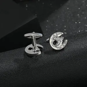 Detail view showing silver horse head cufflinks with sparkling crystal inlay and toggle back