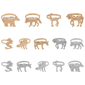 Set de 14 servilleteros metálicos en oro y plata con diseños de oso, lobo y caballo real