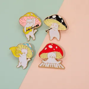 Lot de 4 épinglettes en émail représentant d'adorables chats champignons jouant de la musique