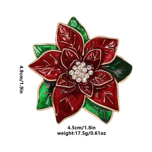 Eleganter rot-grüner Emaille-Weihnachtsstern-Brosche mit weißen Strasssteinen in Gold