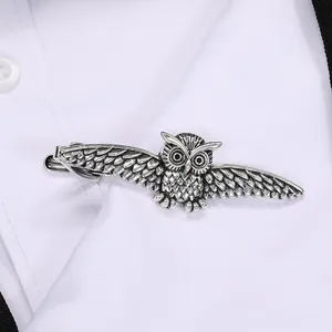 Vintage silver owl necktie clip for men on white shirt, business suit accessory