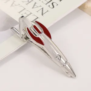 Polished silver rocket shaped tie clip with red enamel details for men business suits