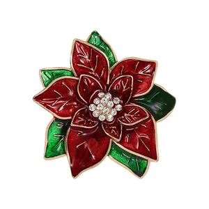 Eleganter Weihnachtsstern-Brosche mit roter Emaille und funkelnden Kristallen