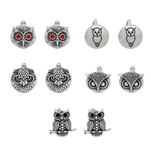 Set of 5 pairs of men's owl cufflink designs in silver finish with red rhinestone eyes