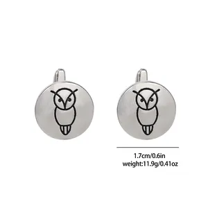 Detailed view of silver owl cufflinks featuring black etched patterns and size dimensions