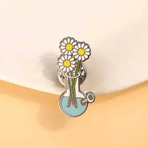 Daisy enamel pin featuring white flowers in a blue laboratory flask on lapel pin
