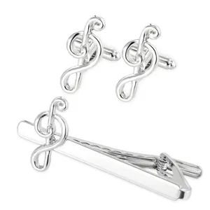 Polished silver musical treble clef tie clip and cufflinks set for men's business wear