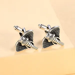 Vintage silver elephant cufflinks with intricate textured ears and classic bullet back