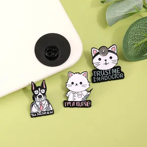 Detailed view of three cute cat and dog enamel pins with doctor and nurse medical themes