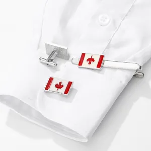 Business cufflinks and tie clip set featuring Canadian flag maple leaf on white shirt