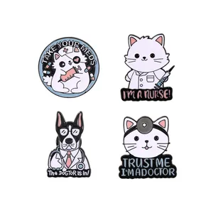 Set of four cute cartoon cat and dog enamel pins featuring doctor and nurse medical themes