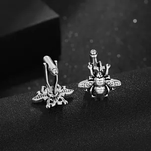 Eleganti gemelli a forma di ape in argento con strass e chiusura a proiettile