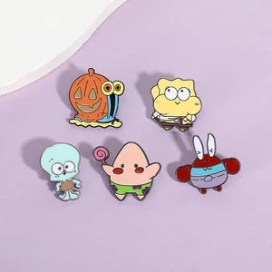 Set of five cartoon enamel pins featuring sea characters on a pastel background