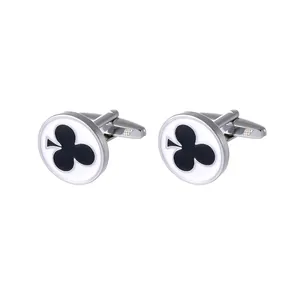 Pair of polished silver metal cufflinks with white enamel club poker pattern design