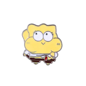 Detailed close-up of a cute yellow cartoon character enamel pin with vibrant metal plating