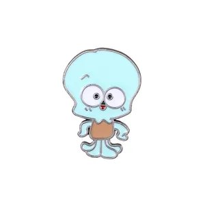 Detailed close-up of a cute cartoon octopus enamel pin with polished metal edges