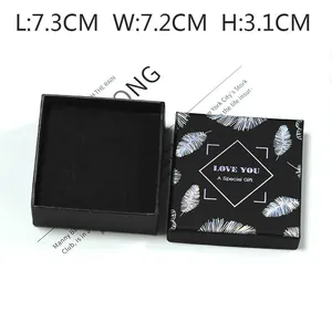 Black square gift box with silver feather print and foam insert for cufflinks and jewelry