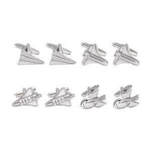 Detailed set of silver-tone airplane, rocket, and shuttle cufflinks with T-bar closures