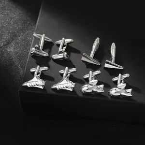 Silver airplane and rocket cufflinks set for business shirts on a black background