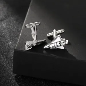 Polished silver shuttle cufflinks with white enamel detail for business attire