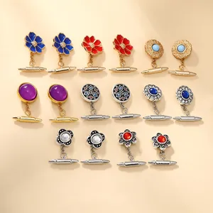 Kollektion französischer Vintage-Manschettenknöpfe mit Blumenemaille und Edelsteinen