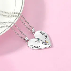 Mother and daughter interlocking heart necklace set with colorful butterfly engraving