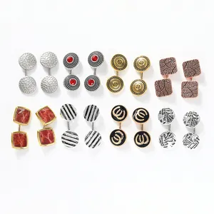Flachbild-Manschettenknopf-Set mit strukturierten Metalldesigns und farbigen Mustern