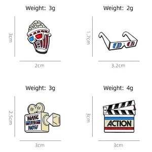 Movie themed enamel pin set with popcorn, 3D glasses, camera and clapboard badges