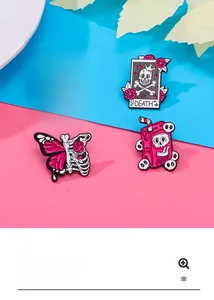 Detailed view of four punk pink skeleton enamel pins on a blue and pink background