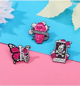 Detailed punk pink skeleton chest pins with gothic coffin and butterfly wings design