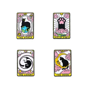 Set of four cute cartoon cat tarot enamel pins including The Lovers and The Moon designs