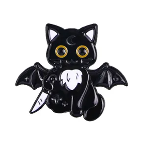 Gothic black cat enamel pin featuring bat wings and a dagger for Halloween decor