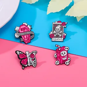 Pink gothic enamel pins set featuring skeleton ribcage and tarot card design
