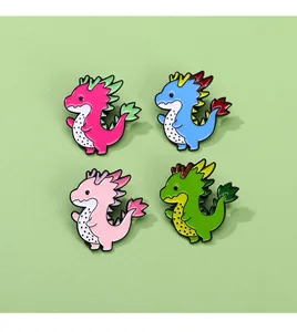 Detailed view of four colorful dragon fruit dinosaur enamel pins in vibrant shades