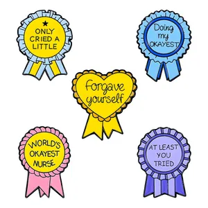 Set of 5 cartoon medal enamel pins with inspirational quotes and colorful ribbon designs