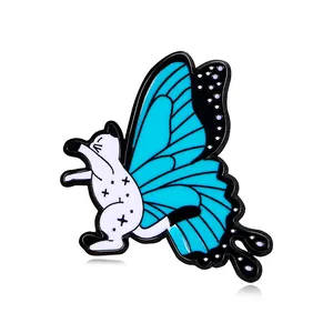 Cute butterfly cat enamel pin featuring blue wings and star patterns on a white background