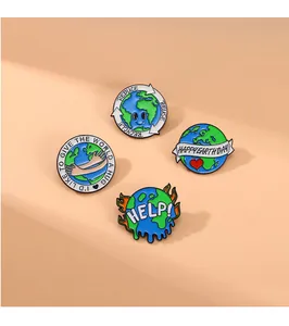 Set of four eco-friendly enamel pins with Earth protection slogans on pink background