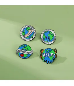 Detailed view of four eco-friendly enamel pins set featuring Earth Day slogans and designs
