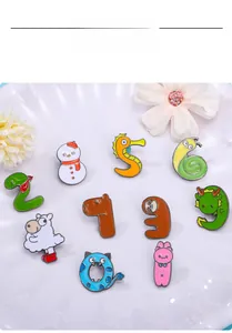 Set di dieci spille smaltate colorate con animali a forma di numeri da 0 a 9