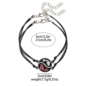 Detailed view of Yin Yang fish woven bracelets with size measurements and 2cm alloy charms