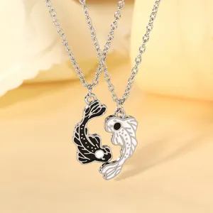 Yin Yang koi fish necklaces set with black and white enamel pendants for couples