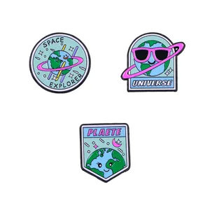 Space explorer enamel pin set featuring cartoon earth designs and cosmos motifs