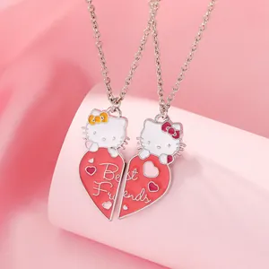 Hello Kitty heart-shaped best friends necklace set on elegant pink silk background