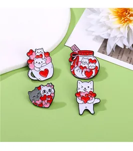 Detail of four cute cat enamel pins featuring heart and coffee cup designs on a stand