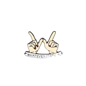 Enamel pin featuring hands forming a W shape with Whatever Forever banner and red nails