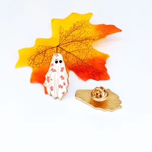 Creative Dubai style enamel ghost brooch with red floral pattern and golden metal edge