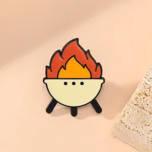 Creative outdoor camping BBQ grill enamel pin badge with vibrant flame design